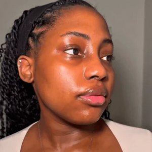 Customer smiling after using Glow SkinCo™ mask